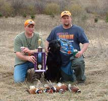 Jason Bauer and Chester Bauer taking 1st place in the 
2 man team hunt at the WERGF 4th Annual Fun Pheasant Hunters Tournament with Doc a six year old Black Lab.  Jason, Chester, & Doc harvested 8 pheasant in the 45 minute hunt.