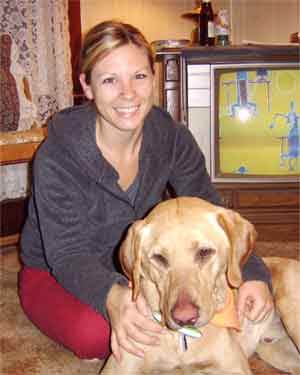 Lacy and her Lab, resting at the lodge